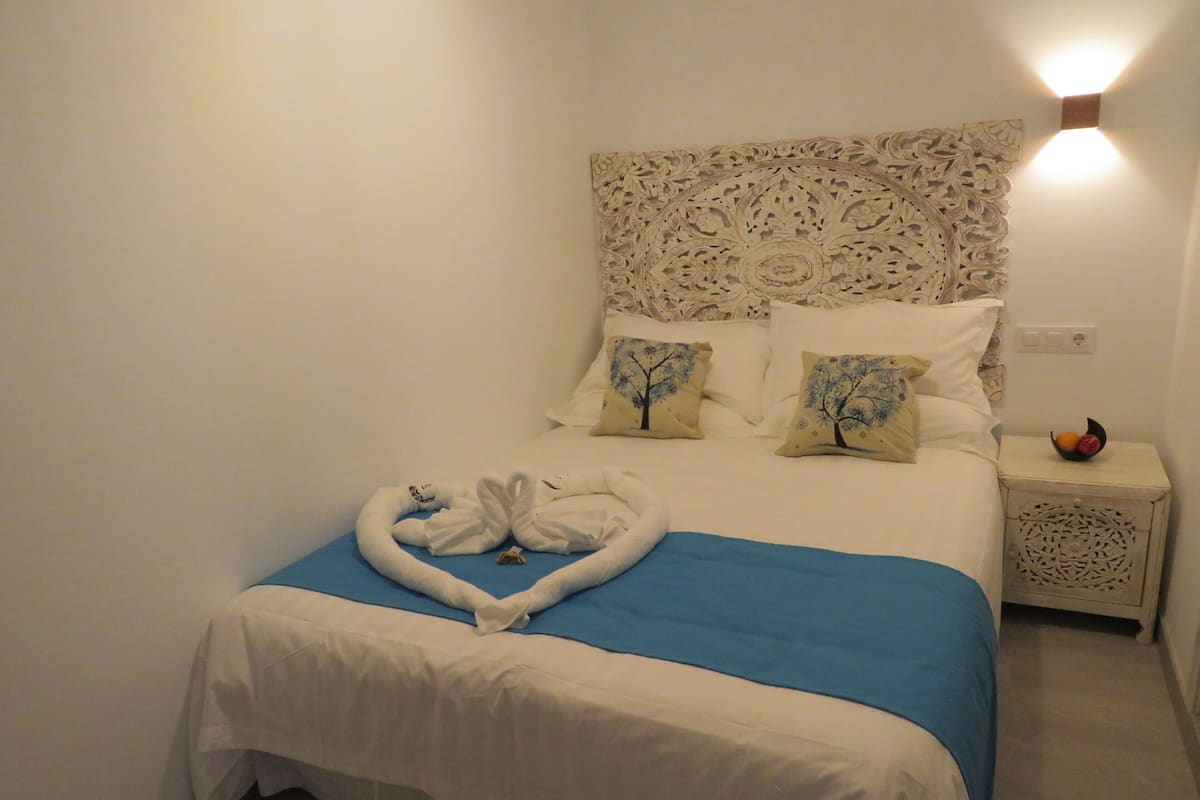 Egyptian cotton sheets, premium bedding, down duvets, memory-foam beds