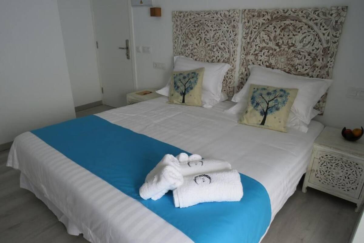 Egyptian cotton sheets, premium bedding, down duvets, memory-foam beds