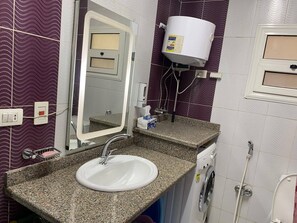Shower, towels, soap, shampoo