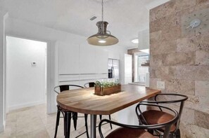 Dining - Sunny 2BR Retreat | Walk to Beach + Pool Access (Pompano Beach)