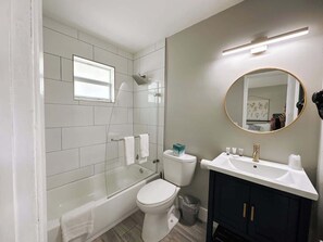 Shower, hair dryer, toilet paper