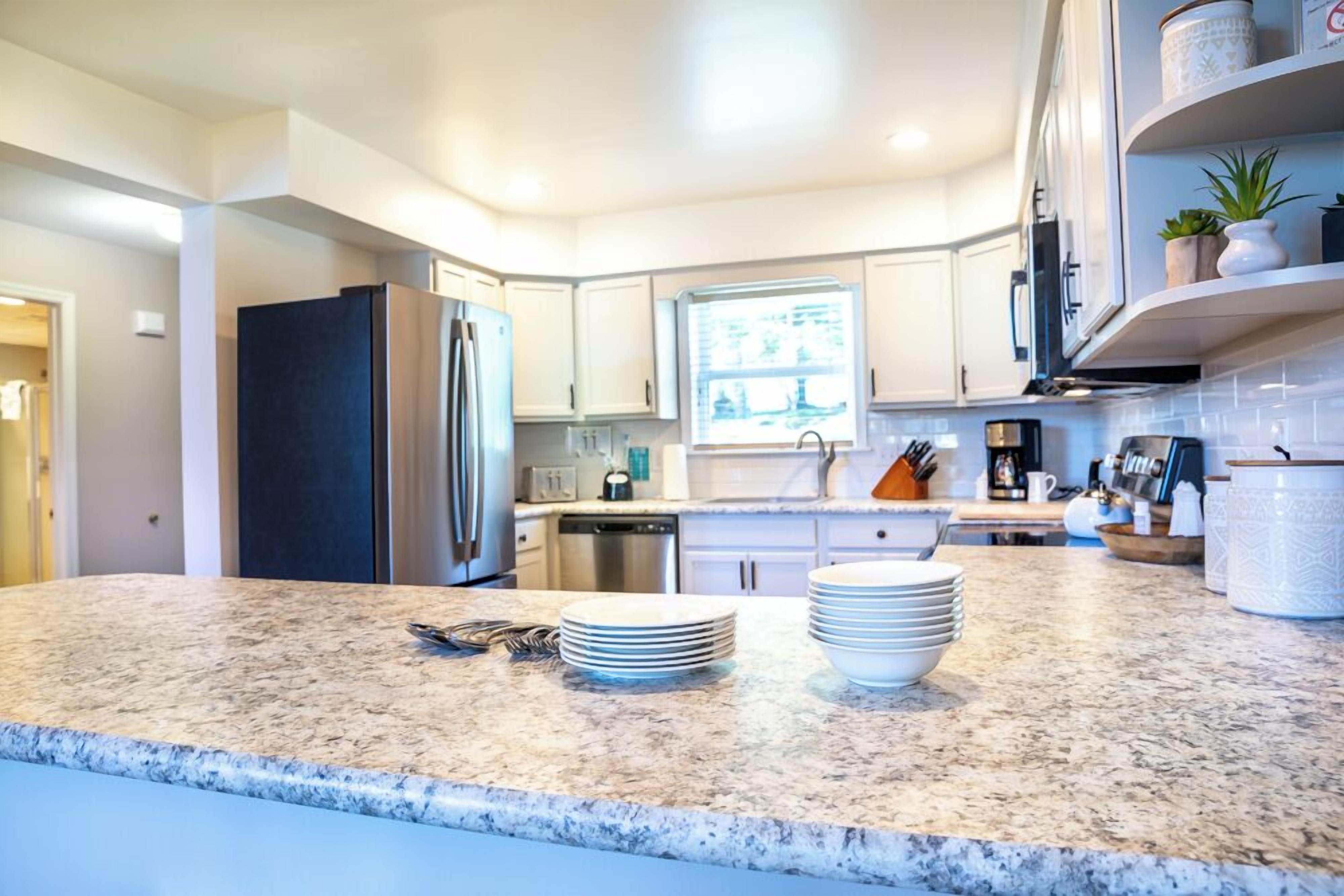 Family Suite, 2 Bedrooms | Private kitchen | Coffee/tea maker, dining tables