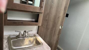 Shower, towels, soap, shampoo