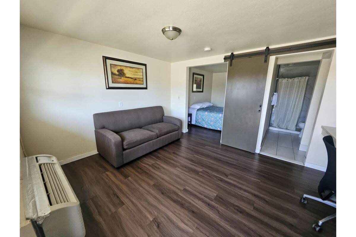 Room, 1 King Bed with Sofa bed | 1 bedroom, desk, iron/ironing board, free WiFi