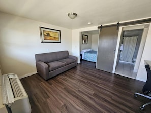 Room, 1 King Bed with Sofa bed | 1 bedroom, desk, iron/ironing board, free WiFi