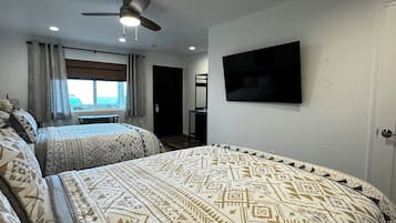 Room, 2 Queen Beds | Iron/ironing board, travel cot, free WiFi, bed sheets