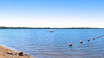 En la playa y toallas de playa