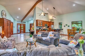 Älytelevisio, DVD-soitin, pöytätennispöytä, kirjoja