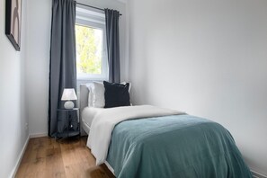 2 habitaciones, tabla de planchar con plancha, wifi y ropa de cama