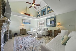 TV, fireplace - Palm Oasis - Pet Friendly Cottage Near the Water with Private Pool Area (Miramar Beach)