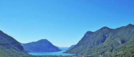A mountainous landscape with a town nestled in the valley.