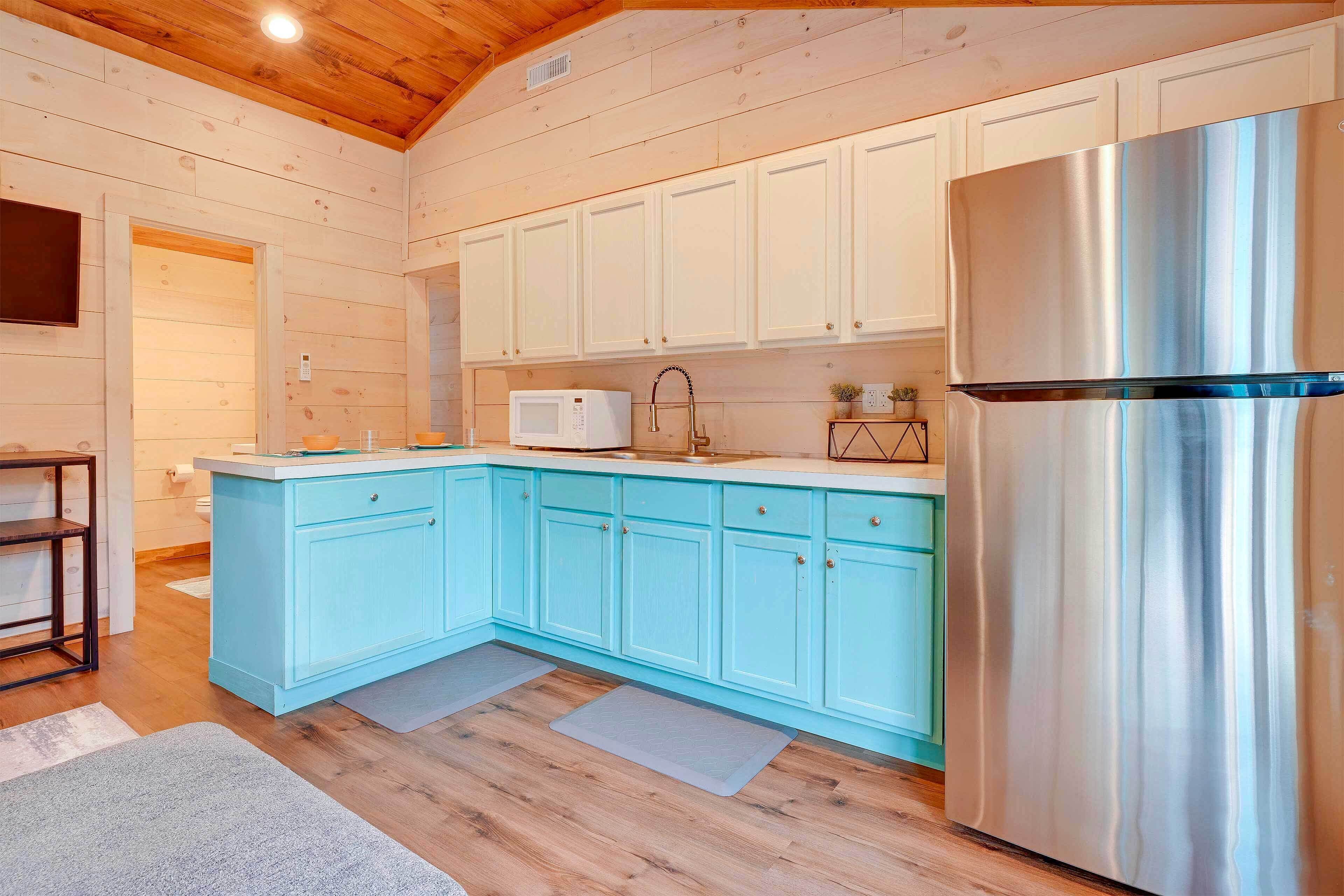 Fridge, stovetop, dishwasher, coffee/tea maker
