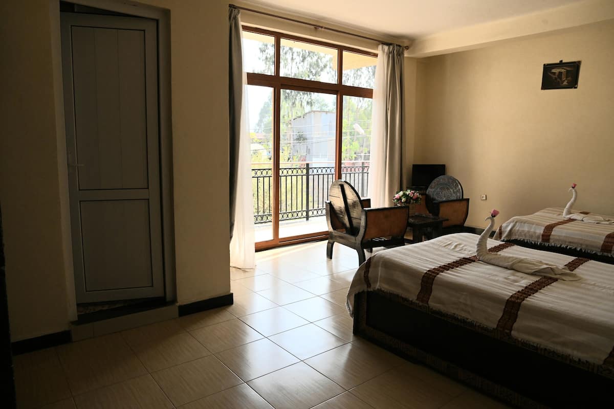 Deluxe Twin Room | In-room safe, blackout drapes, soundproofing, iron/ironing board