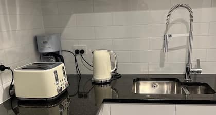 Self-contained nice 2 bedroom flat with own kitchenette, bathroom and entrance.