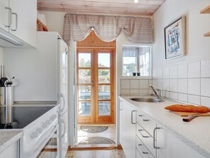 Fridge, oven, high chair, cookware/dishes/utensils