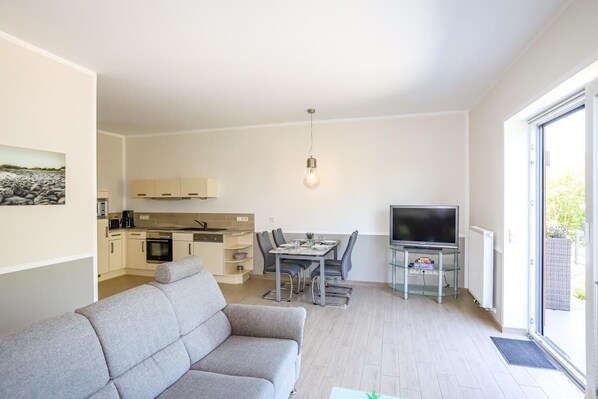 Condo | Living area | Flat-screen TV, heated floors