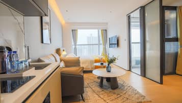 Chambre exécutive | Fer et planche à repasser, accÚs au Wi-Fi (inclus)