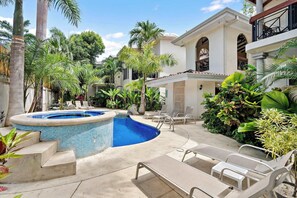 Pool - Trendy Renovated Condo w/ Private Patio, Shared Pool & Jacuzzi Near the Beach (Calle Mango Playa Potrer)