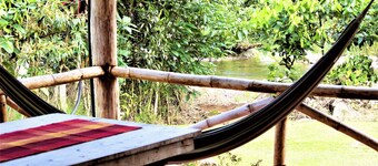 Authentic Vacation Home in Unique Setting of 25 Acres of Tropial River Landscap