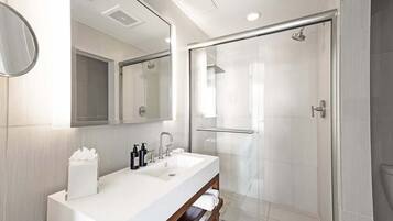 Shower, hair dryer, towels, shampoo