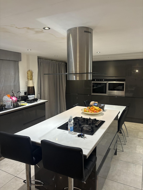 House, Multiple Beds | Private kitchen