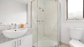 Shower, hair dryer, soap, shampoo