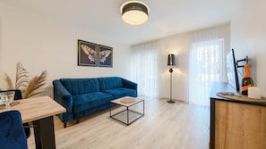 Apartment (2) | Living area | Flat-screen TV