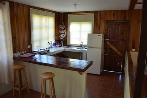 Fridge, stovetop, coffee/tea maker, blender