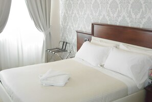 ห้องดีลักซ์ดับเบิล | เครื่องนอนระดับพรีเมียม, ผ้านวมขนเป็ด, เตียงพร้อมฟูกเสริมที่นอน