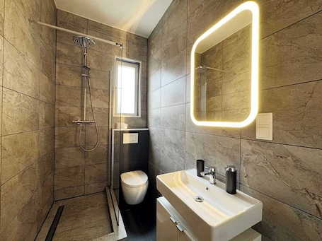Shower, hair dryer, bathrobes, towels. Huge apartment with Sauna and free parking