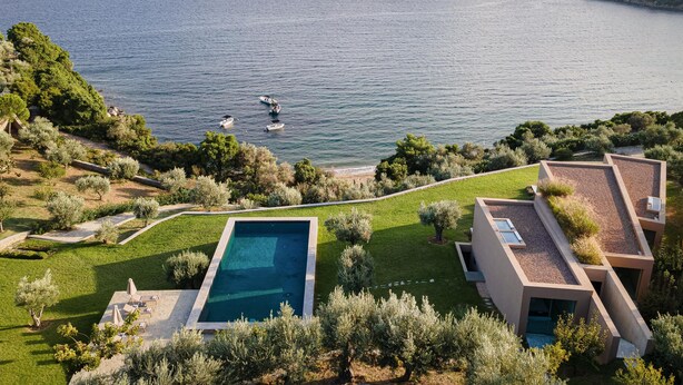 A modern villa with a swimming pool, a landscaped garden, and a view of the sea. - Villa Pelagoon  (Skiathos)