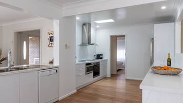 Coffee/tea maker, fridge, microwave, oven