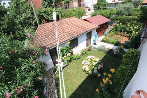 Quarto casal | Vista para o jardim
