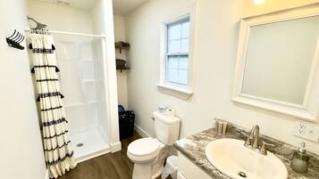 Shower, hair dryer, soap, shampoo