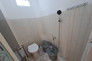 Standard Double Room | Bathroom | Shower, towels, soap - Hotel O Venus Homestay Syariah Near Universitas Megou Pak Tulang Bawang (Menggala)