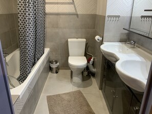 Hair dryer, towels, soap, toilet paper