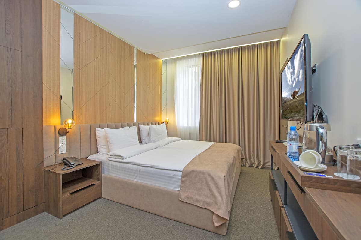 Doppia Deluxe | Biancheria da letto di alta qualità, minibar, con stile personalizzato