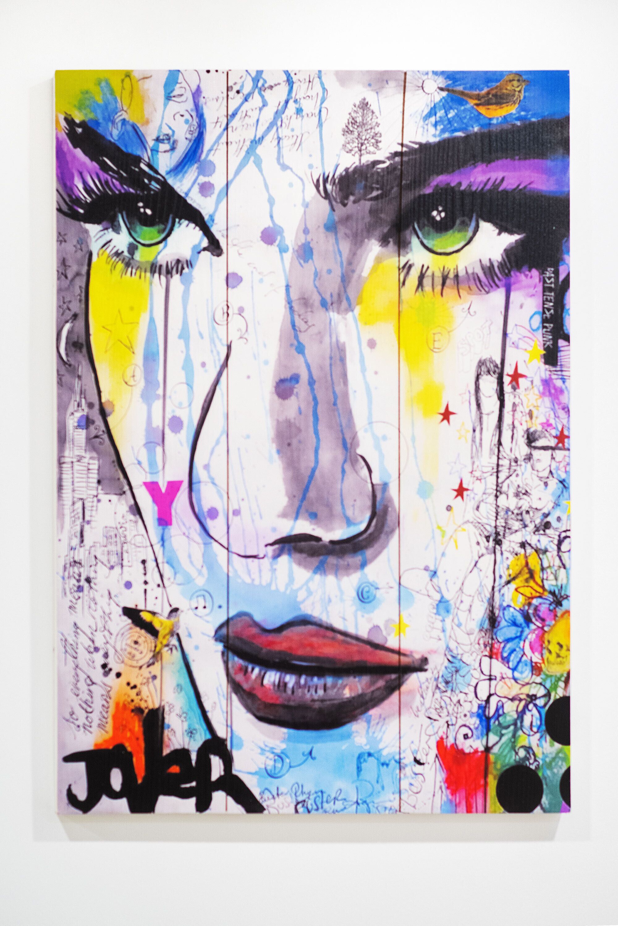 A colorful abstract painting with prominent eyes and abstract elements.
