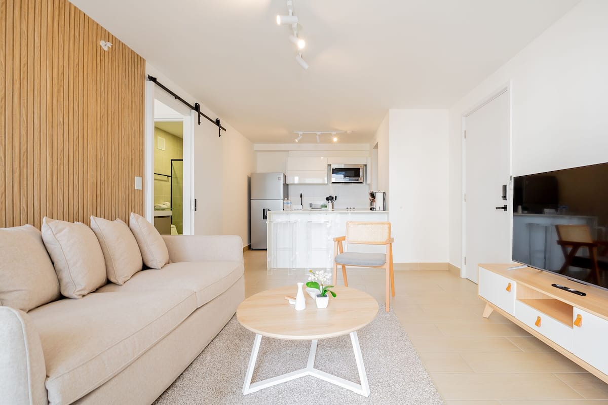 Apartment (11I) | Living area | 55-inch Smart TV with cable channels