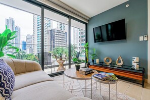 Apartment (10D) | Living area | 55-inch Smart TV with cable channels