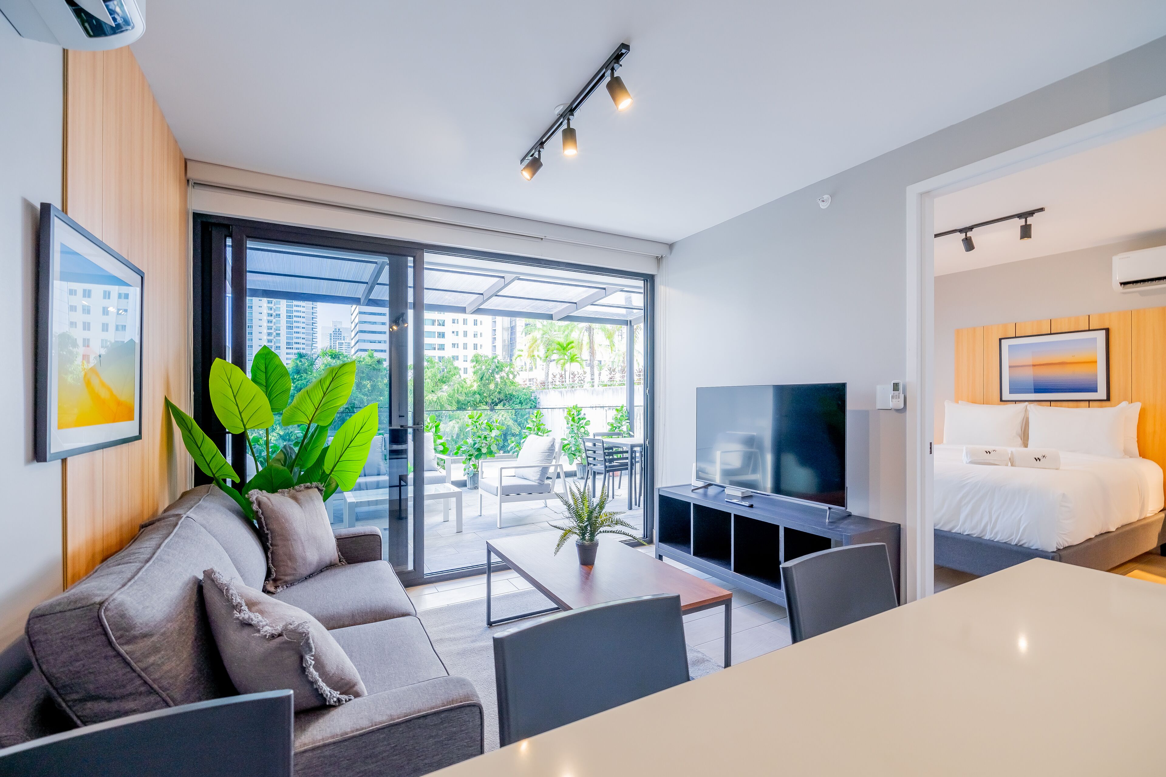 Elite Apartment (08D) | Living area | 55-inch Smart TV with cable channels