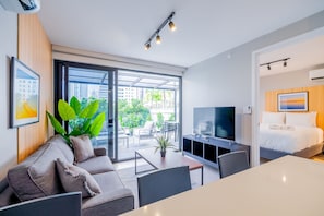 Elite Apartment (08D) | Living area | 55-inch Smart TV with cable channels