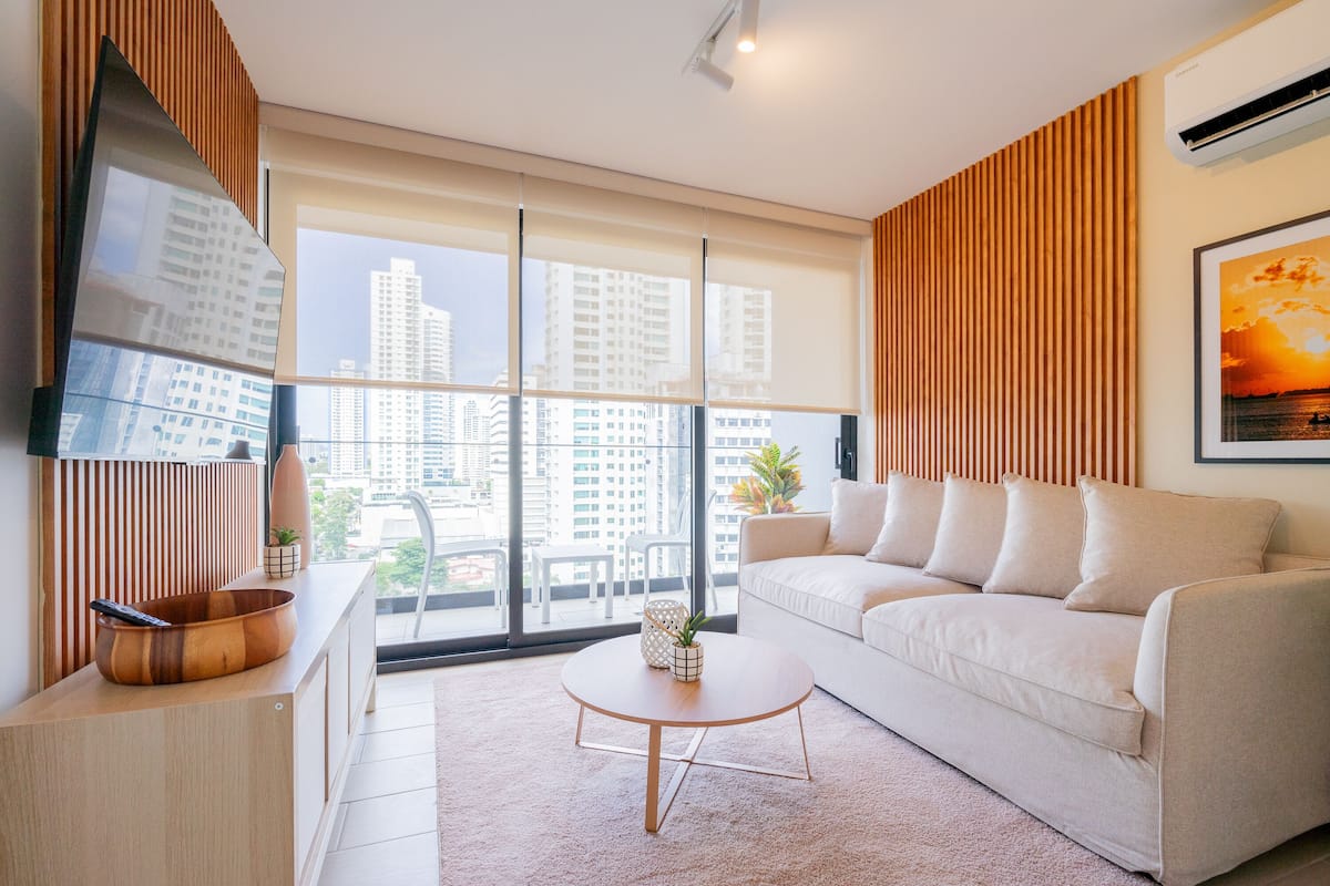 Apartment (15E) | Living area | 55-inch Smart TV with cable channels