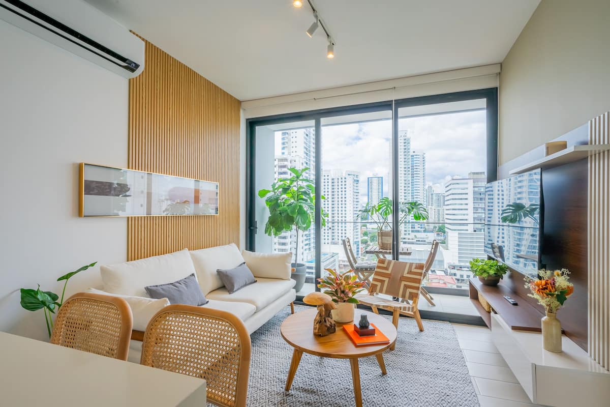 Apartment (19F) | Living area | 55-inch Smart TV with cable channels
