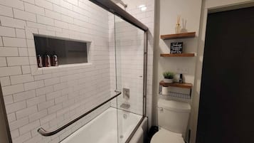 Hair dryer, towels, soap, shampoo