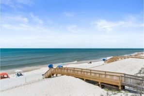 On the beach, sun-loungers