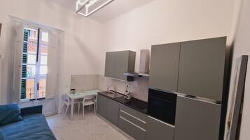 Luxury Suite, 1 Double Bed with Sofa bed, Non Smoking | Private kitchen | Mini-fridge, espresso maker, coffee/tea maker, griddle