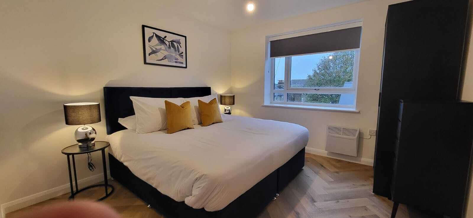 Premium bedding, desk, laptop workspace, soundproofing