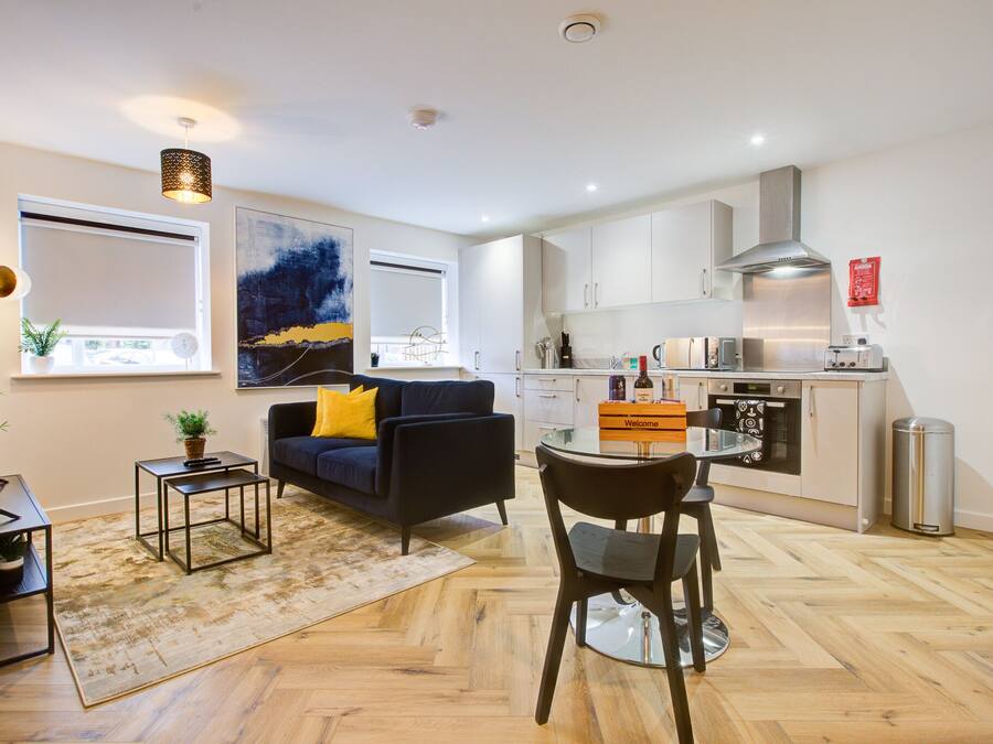 Executive Apartment | Living area | 54-inch Smart TV with cable channels