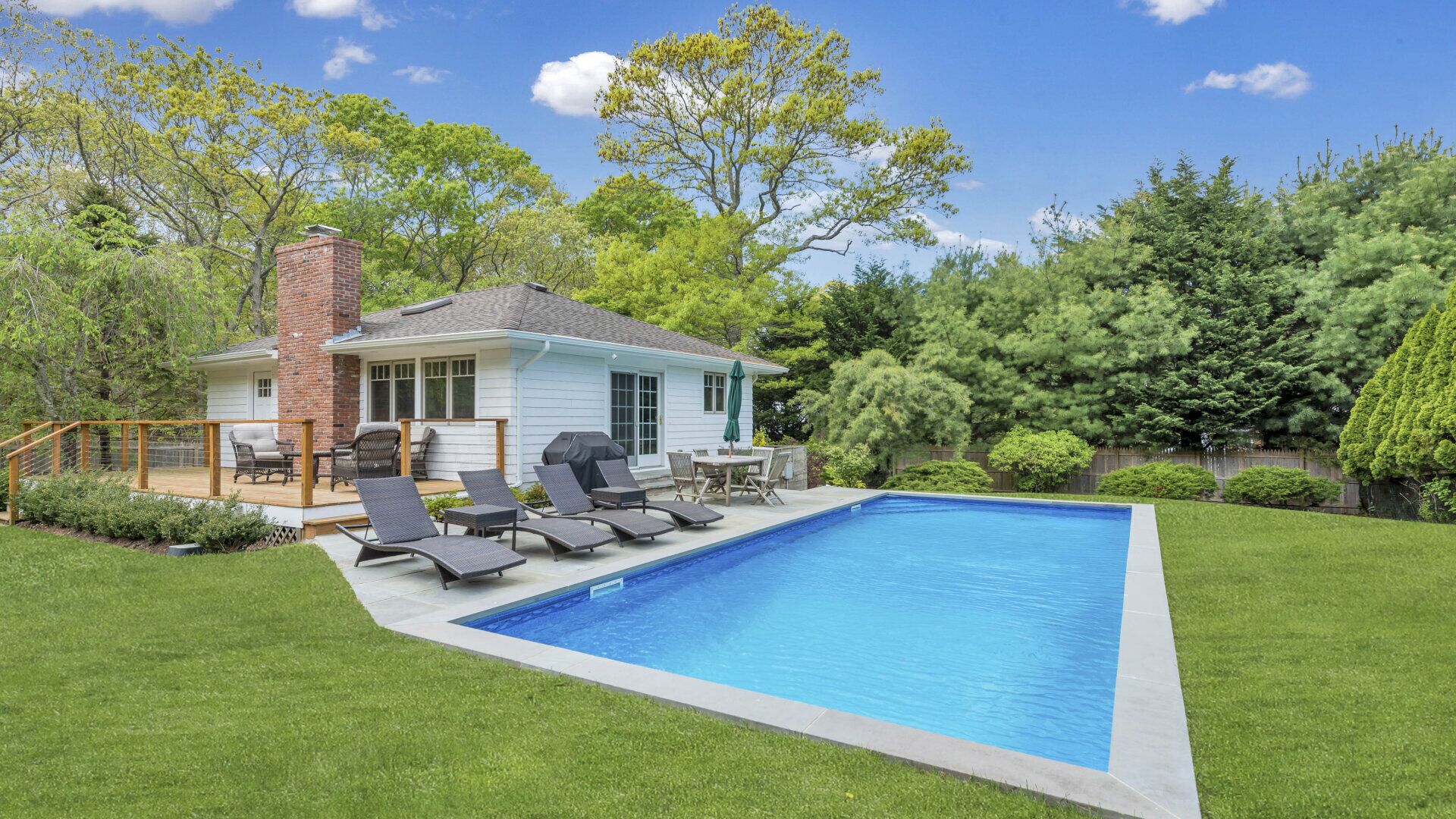 Modern-style home with private pool, open-floor living plan, back porch,...